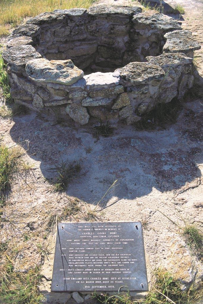 Plaque commemorating Charles Hunt at Tammin's well. Tammin's well is perfectly constructed with the circular rock foundation. 
